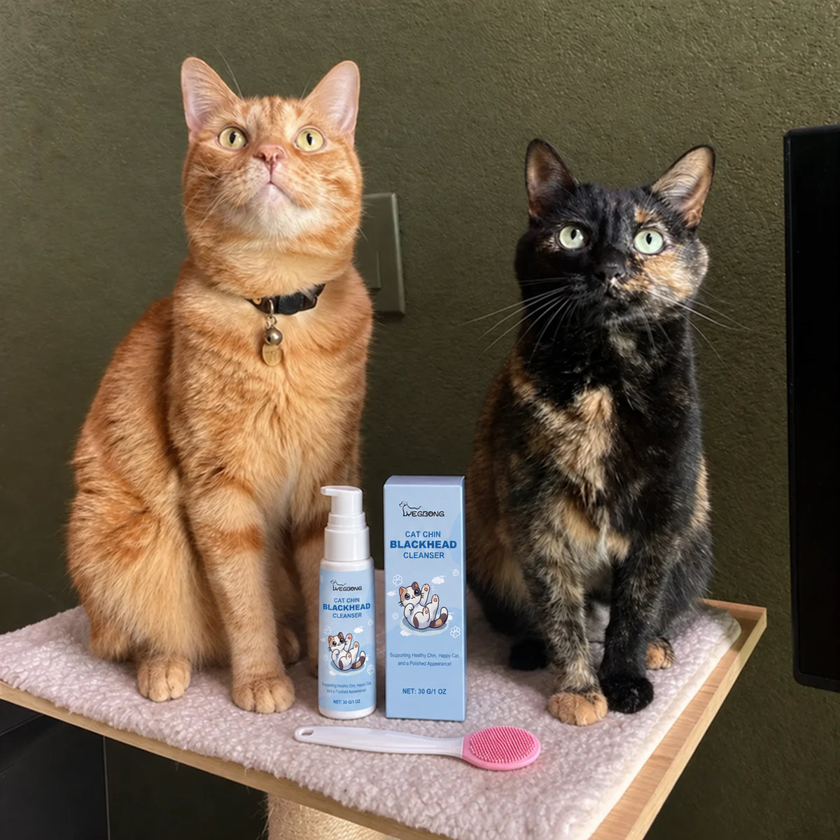 Two cats with YEGBONG cat chin blackhead cleanser bottle, box, and brush